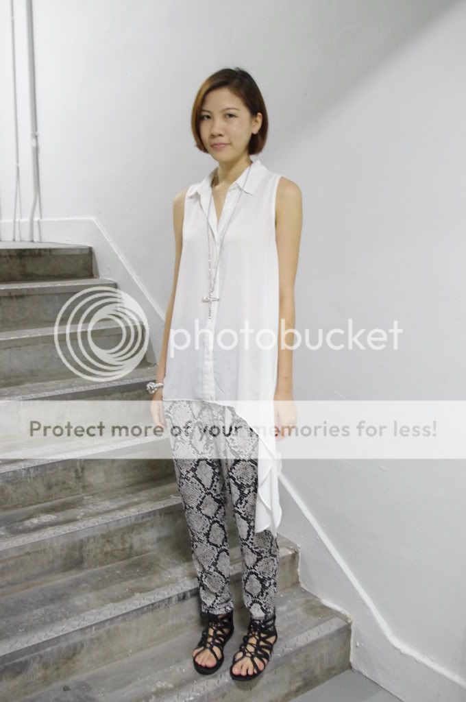 incorporates snake print. snake print blouse. incorporates snake print.