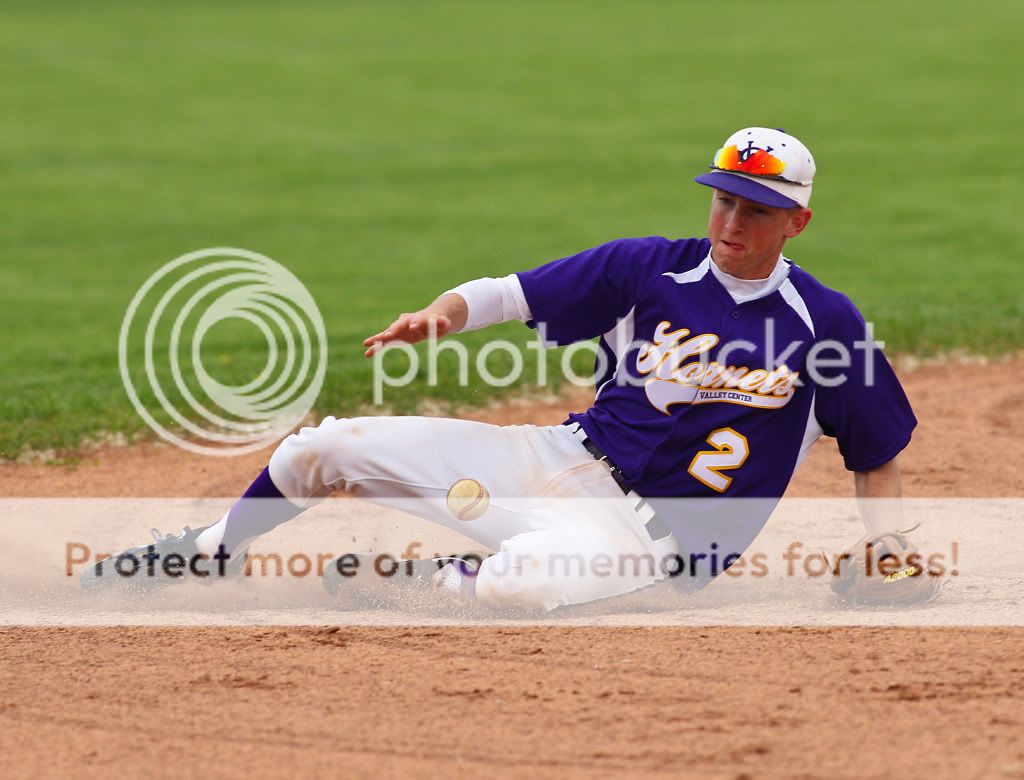 IMAGE: http://i889.photobucket.com/albums/ac91/MARK_9328/Canon%20Forums/VCHS%20Boys%20Varsity%20baseball%20vs%20Salina%20Central/MWIV4554.jpg